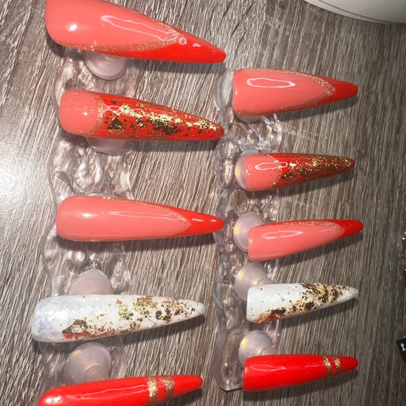 Red and gold stiletto nails! 2 white marbled nails with gold flakes! Gorgeous! - Picture 5 of 12